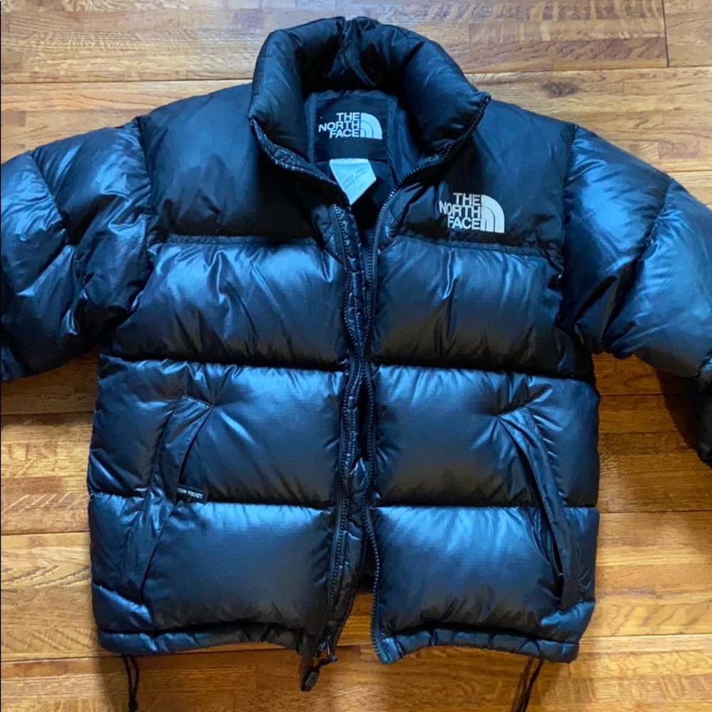 Women’s black & puffy The North Face winter coat